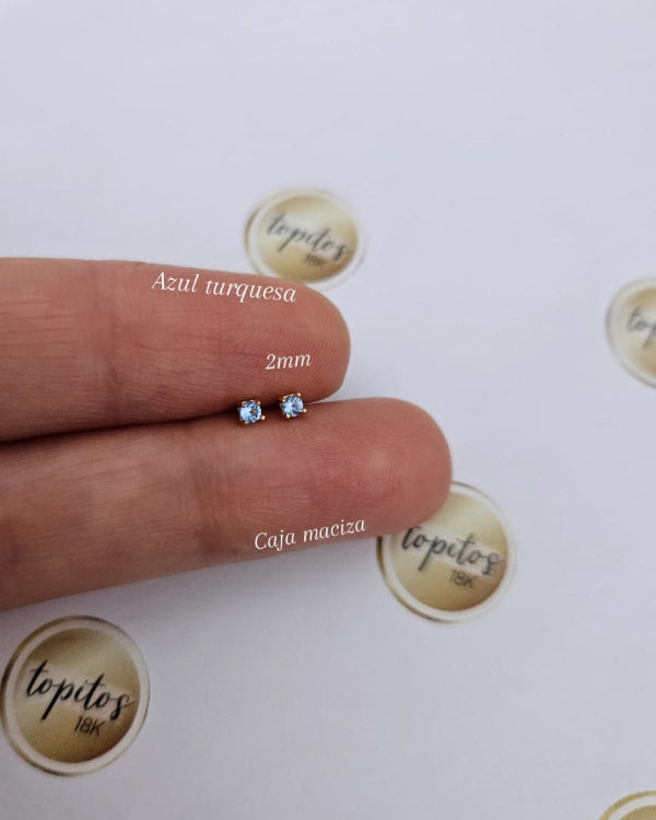 Topos zircones azul turquesa 2mm, caja maciza