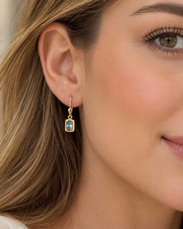 Aretas bambalinas 2.5cm, con zircon suizo azul turquesa, Oro 18k ley 750
