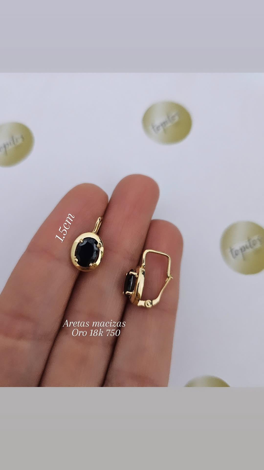 Aretas macizas con zircon suizo negro, oro 18k ley 750